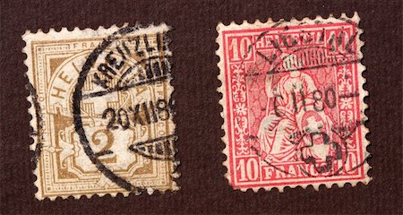 simsearch:400-04832369,k - Close up of ancient old postal stamps Photographie de stock - Aubaine LD & Abonnement, Code: 400-05237800