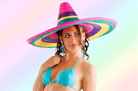 simsearch:400-05755679,k - summer portrait of a cute girl wearing a bikini colored scarf and a big colorful hat like a sombrero Stock Photo - Budget Royalty-Free & Subscription, Code: 400-05238607