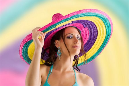 simsearch:400-05755679,k - summer portrait of a cute girl wearing a bikini colored scarf and a big colorful hat like a sombrero Stock Photo - Budget Royalty-Free & Subscription, Code: 400-05238609