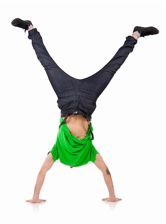 Young bboy standing on hands. Holding legs in air. Stock Photo - Budget Royalty-Free & Subscription, Code: 400-05238783