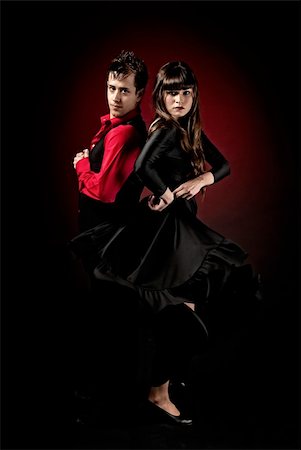 flamenco man and woman - High contrast Young couple passion flamenco dancing on red light background. Stock Photo - Budget Royalty-Free & Subscription, Code: 400-05239860