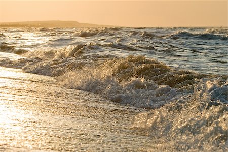 simsearch:400-07748817,k - Splashing sea wave in sunset or sunrise light Stock Photo - Budget Royalty-Free & Subscription, Code: 400-05230843