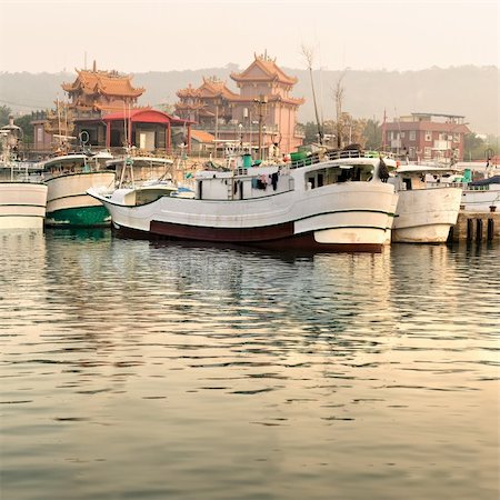 Boats in harbor with Chinese temple in morning. Stock Photo - Budget Royalty-Free & Subscription, Code: 400-05231755