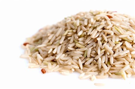 Pile of brown rice isolated on white background Stock Photo - Budget Royalty-Free & Subscription, Code: 400-05244709