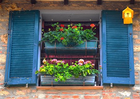 simsearch:400-04393153,k - Typical Italian Window With Open Wooden Shutters, Decorated With Fresh Flowers Stock Photo - Budget Royalty-Free & Subscription, Code: 400-05244865
