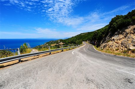 Winding Road In The Mountains Along The Coast Stock Photo - Budget Royalty-Free & Subscription, Code: 400-05244866