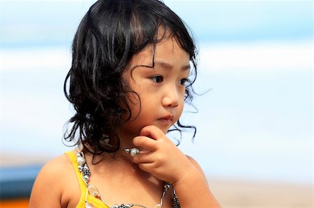 simsearch:400-06389659,k - Portrait of the beautiful small Asian girl.  Indonesia. Java Foto de stock - Super Valor sin royalties y Suscripción, Código: 400-05245900