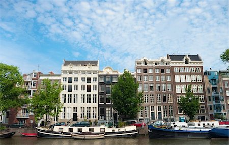medieval amsterdam houses with their typically facades along a canal Stock Photo - Budget Royalty-Free & Subscription, Code: 400-05247159