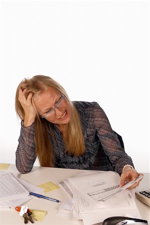 Completely stressed out secretary at her messy desk Stock Photo - Budget Royalty-Free & Subscription, Code: 400-05247285