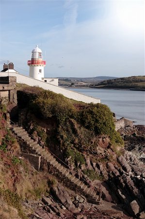 simsearch:400-07405238,k - lighthouse during a sunny day on the rocks in with steps to beach in youghal county cork ireland Foto de stock - Super Valor sin royalties y Suscripción, Código: 400-05248917