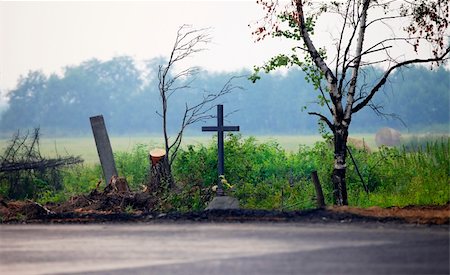 simsearch:400-04032243,k - Old wooden crosses at edge of road Stock Photo - Budget Royalty-Free & Subscription, Code: 400-05249458