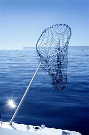 simsearch:400-05254289,k - Fishing scoop net on boat with blue sea ocean background Stock Photo - Budget Royalty-Free & Subscription, Code: 400-05240654