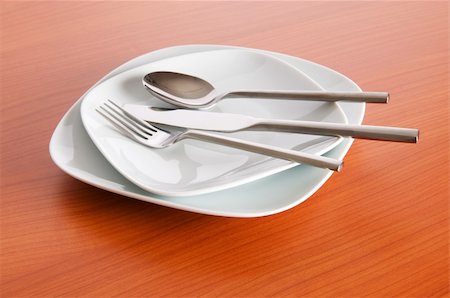 setting kitchen table - Set of utensils arranged on the table Stock Photo - Budget Royalty-Free & Subscription, Code: 400-05254980