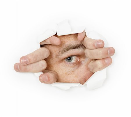 simsearch:400-04748544,k - A man looks through a hole in the paper Stock Photo - Budget Royalty-Free & Subscription, Code: 400-05255063