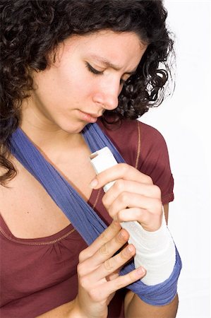 girl with an injured hand Stock Photo - Budget Royalty-Free & Subscription, Code: 400-05256247