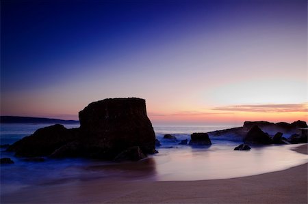 simsearch:400-07091395,k - Landscape picture of rocks on the beach at sunset Foto de stock - Super Valor sin royalties y Suscripción, Código: 400-05257676