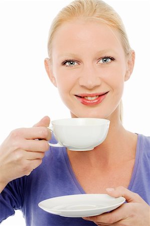 simsearch:400-04398921,k - portrait of a young caucasian woman drinking a cup of tea or coffee Stock Photo - Budget Royalty-Free & Subscription, Code: 400-05266225