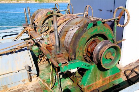 capstan winch of trawler fishing boat power engine to pull the net steel cable Stock Photo - Budget Royalty-Free & Subscription, Code: 400-05267521