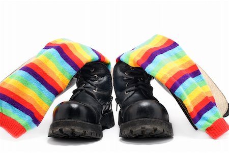 simsearch:400-04658893,k - Heavy shoes and striped socks isolated on white background Photographie de stock - Aubaine LD & Abonnement, Code: 400-05268574