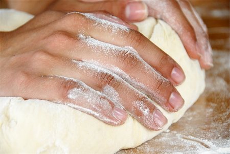 simsearch:649-06845217,k - female hands in flour closeup kneading dough on table Stock Photo - Budget Royalty-Free & Subscription, Code: 400-05268663