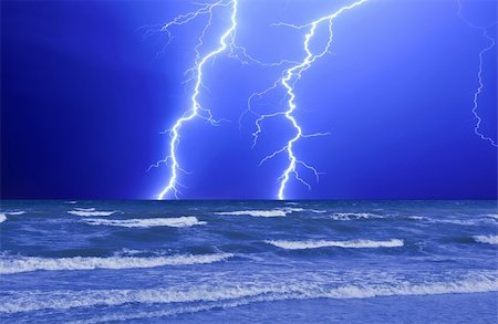 simsearch:400-04256241,k - Thunderstorm and perfect Lightning over the wave ocean Stock Photo - Budget Royalty-Free & Subscription, Code: 400-05268678