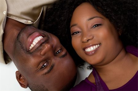 simsearch:400-04739802,k - Happy black couple smiling Stock Photo - Budget Royalty-Free & Subscription, Code: 400-05269427