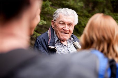 A grandfather talking a group of grandchildren Stock Photo - Budget Royalty-Free & Subscription, Code: 400-05260044