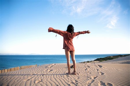 woman at sand dune in spain with african horizon Stock Photo - Budget Royalty-Free & Subscription, Code: 400-05260737