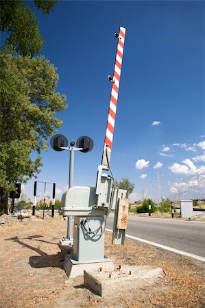 pictures of light rail transit signals - rural level crossing next to segovia city in spain Stock Photo - Budget Royalty-Free & Subscription, Code: 400-05260852