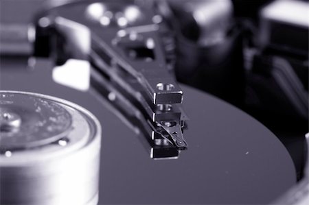 simsearch:400-05252692,k - Macro photo - Hard Disk Drive. Great details ! Stock Photo - Budget Royalty-Free & Subscription, Code: 400-05261188