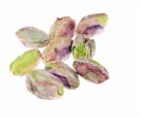 simsearch:400-04833195,k - A closeup shot of a bunch of peeled Pistachio nuts. Isolated over white. Stock Photo - Budget Royalty-Free & Subscription, Code: 400-05261273