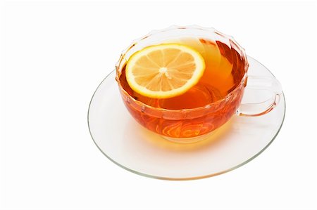 simsearch:400-04273561,k - glass cup with tea and a lemon on a white background Stock Photo - Budget Royalty-Free & Subscription, Code: 400-05261335
