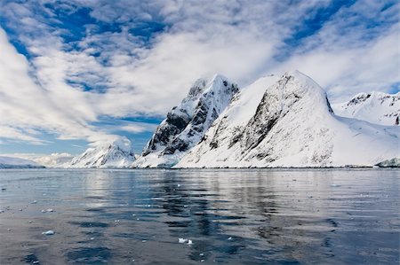 simsearch:400-05271801,k - Beautiful snow-capped mountains against the blue sky Stock Photo - Budget Royalty-Free & Subscription, Code: 400-05261472