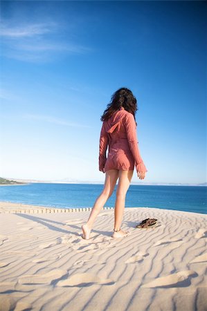 woman at sand dune in spain with african horizon Stock Photo - Budget Royalty-Free & Subscription, Code: 400-05261675