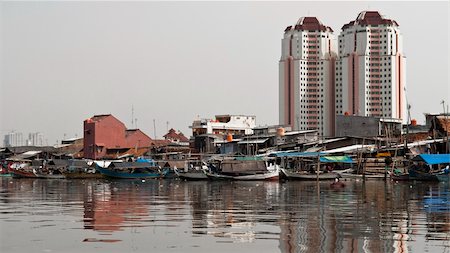 Old canal full of boats in Jakarta harbor, Indonesia Stock Photo - Budget Royalty-Free & Subscription, Code: 400-05261901