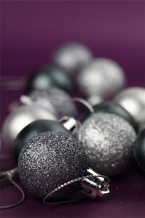 Silver Christmas ornaments on purple background. Copy space Stock Photo - Budget Royalty-Free & Subscription, Code: 400-05262448