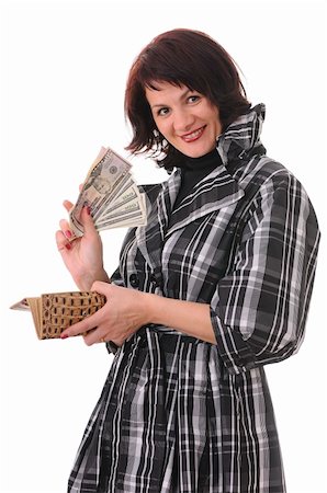 The woman holds in hands a purse and money isolated on white background Stock Photo - Budget Royalty-Free & Subscription, Code: 400-05262738