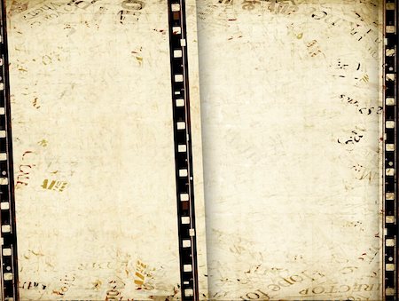 simsearch:400-05102933,k - Closeup of old 35 mm movie Film reel Stock Photo - Budget Royalty-Free & Subscription, Code: 400-05263985