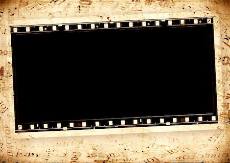 simsearch:400-05102933,k - Closeup of old 35 mm movie Film reel Stock Photo - Budget Royalty-Free & Subscription, Code: 400-05263986