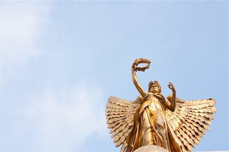 Goddess statue in the sky on a clear sky, beautiful clouds. Stock Photo - Budget Royalty-Free & Subscription, Code: 400-05274387