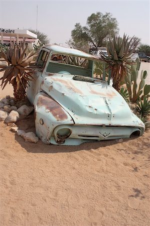 Old car in Namibian desert Stock Photo - Budget Royalty-Free & Subscription, Code: 400-05275041