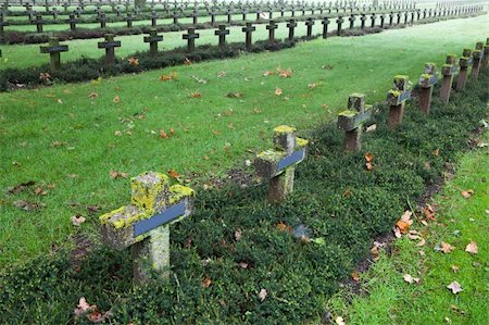 simsearch:400-04032243,k - crosses at cemetery in autumn mist stone tombstones Stock Photo - Budget Royalty-Free & Subscription, Code: 400-05275205