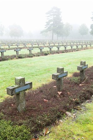 simsearch:400-04032243,k - crosses at cemetery in autumn mist stone tombstones Stock Photo - Budget Royalty-Free & Subscription, Code: 400-05275203