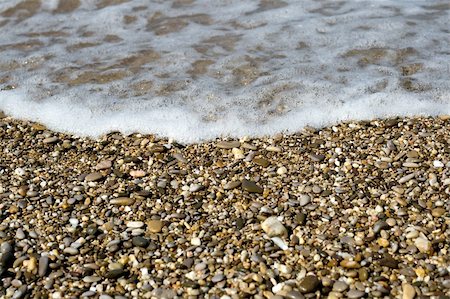 simsearch:400-04114367,k - Pebbles on beach with sea wave Stock Photo - Budget Royalty-Free & Subscription, Code: 400-05277413