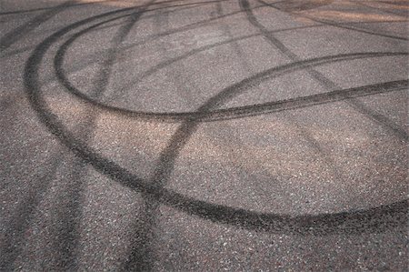 skid marks - Close up of Skidmarks on asphalt Stock Photo - Budget Royalty-Free & Subscription, Code: 400-05270024