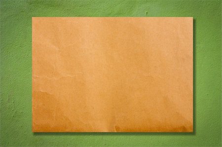 simsearch:400-08074733,k - Brown paper on green cement wall Stock Photo - Budget Royalty-Free & Subscription, Code: 400-05271681