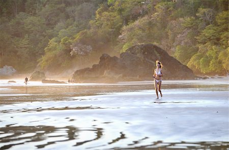 Young beautiful on a beach. One. Coast Pacific of ocean in Costa Rica. Stock Photo - Budget Royalty-Free & Subscription, Code: 400-05272201
