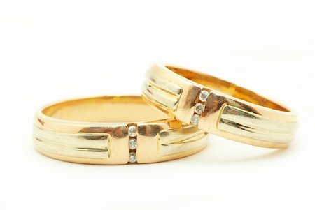 Gold wedding rings isolated on white background Photographie de stock - Aubaine LD & Abonnement, Code: 400-05285387