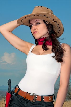 attractive girl in a cowboy hat in a field, portrait Stock Photo - Budget Royalty-Free & Subscription, Code: 400-05286357