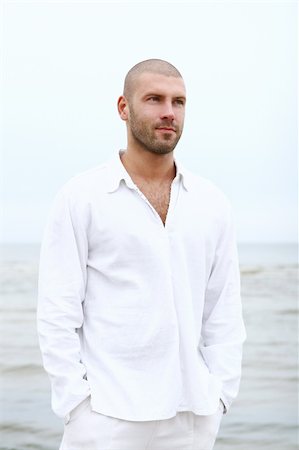 sandi model - attractive and happy man on the beach Stock Photo - Budget Royalty-Free & Subscription, Code: 400-05286453
